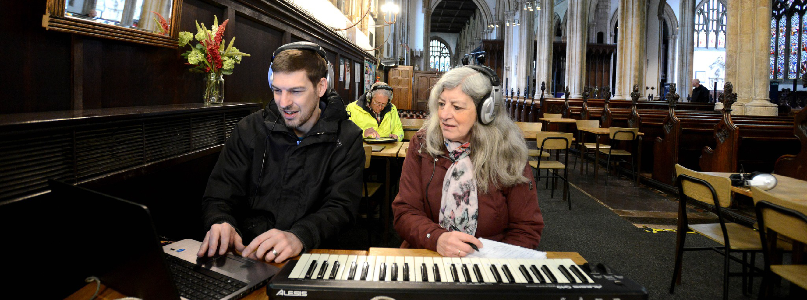 A female participant is guided by a music producer from SoundLINCs as part of our Musical Whispers project